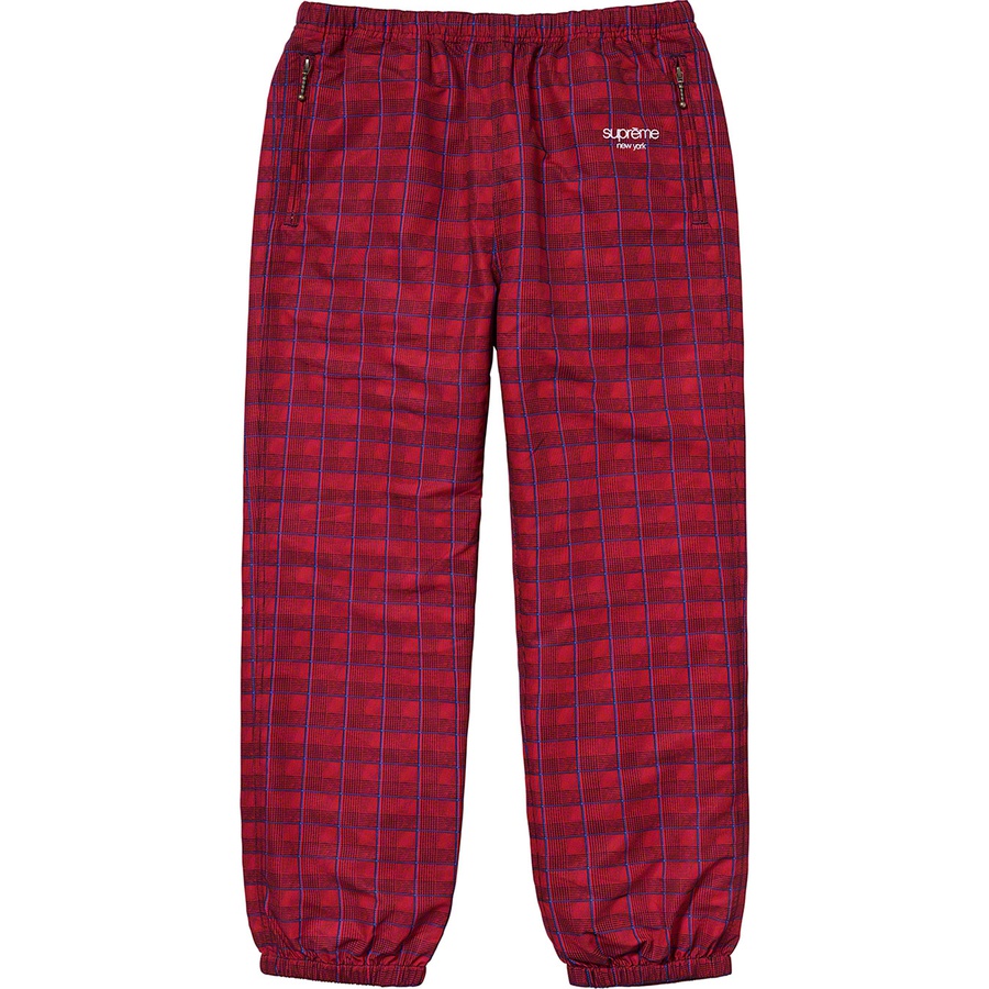 red supreme track pants