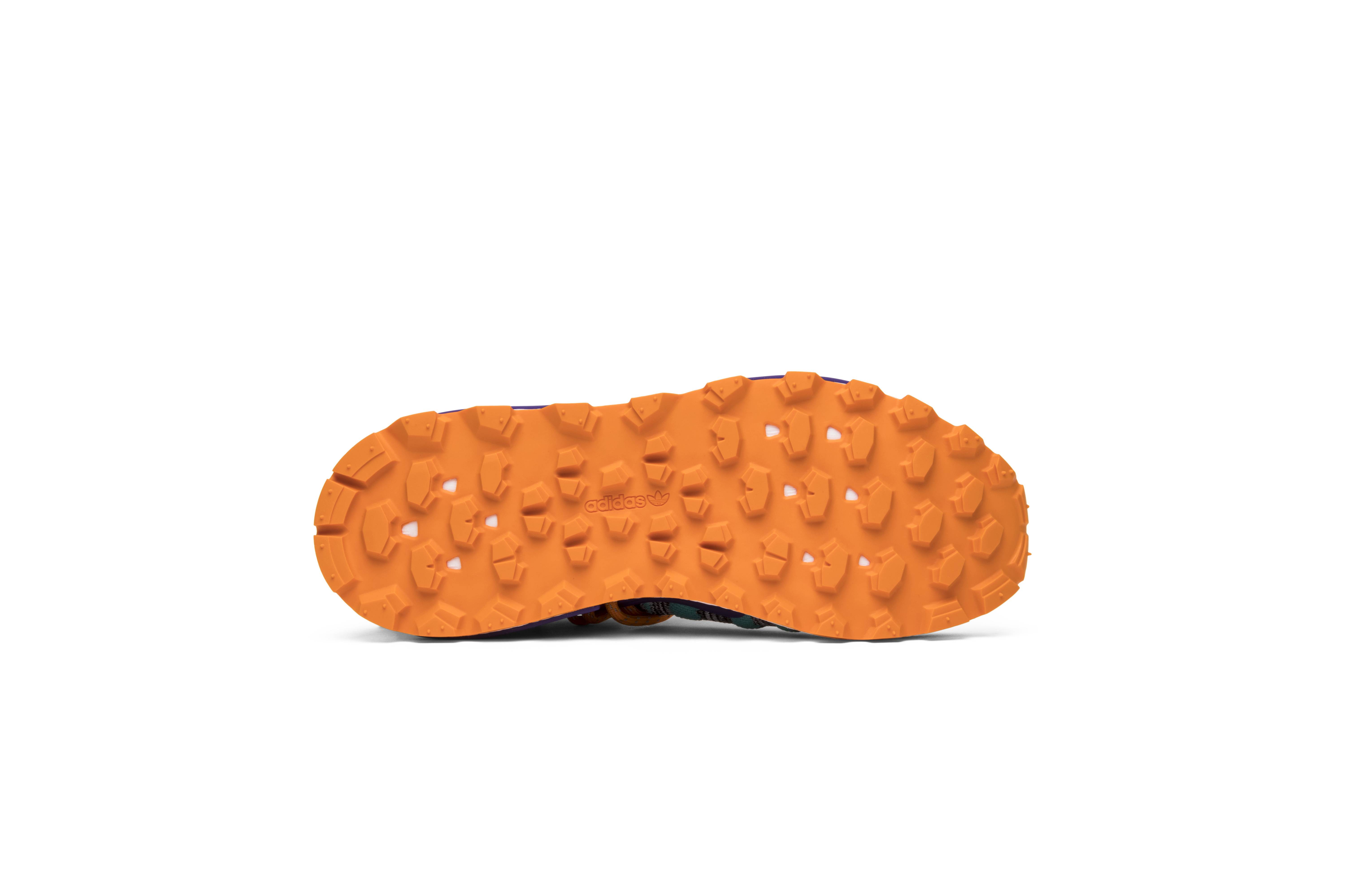 nmd hu pharrell solar pack orange