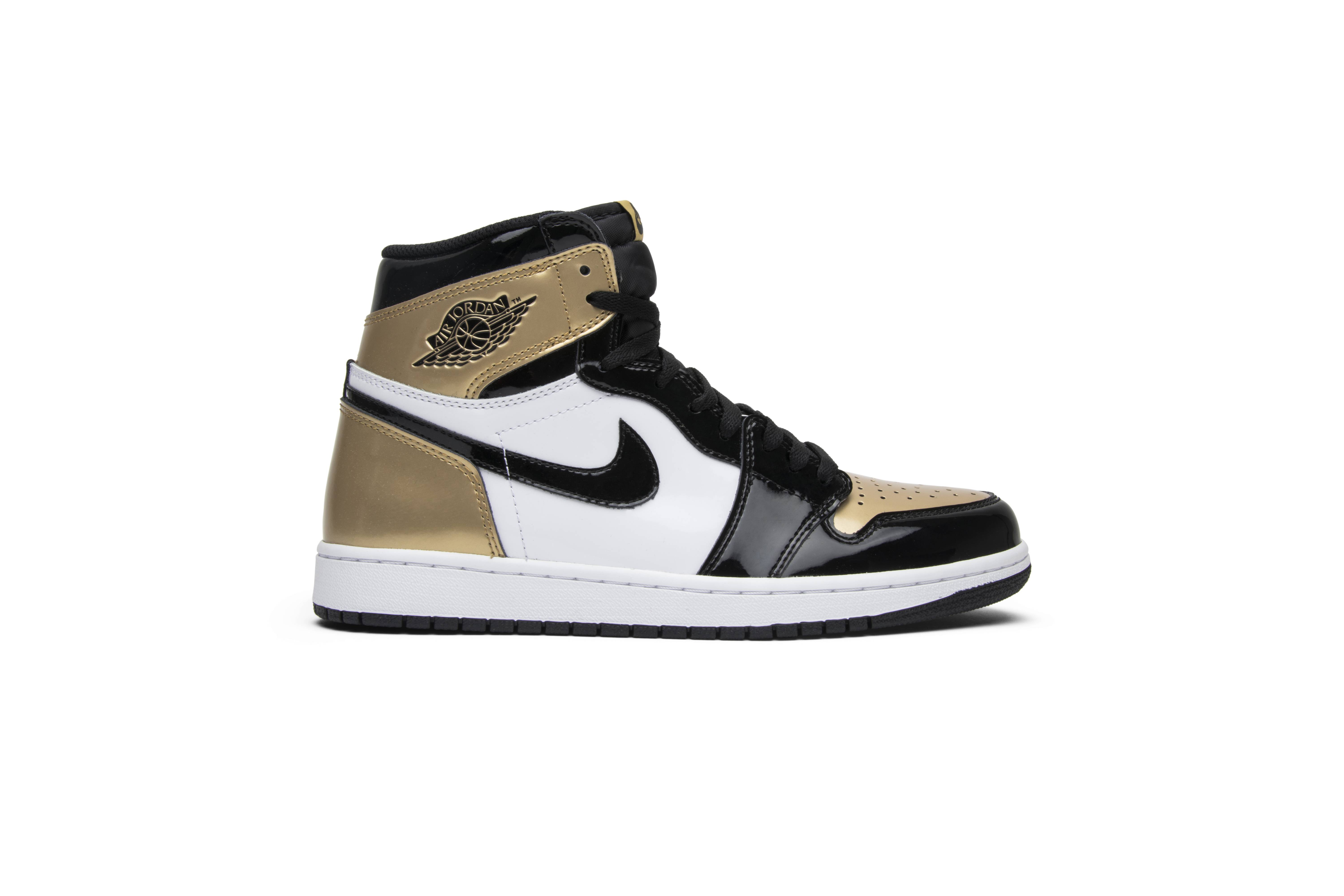 white and gold jordan 1s