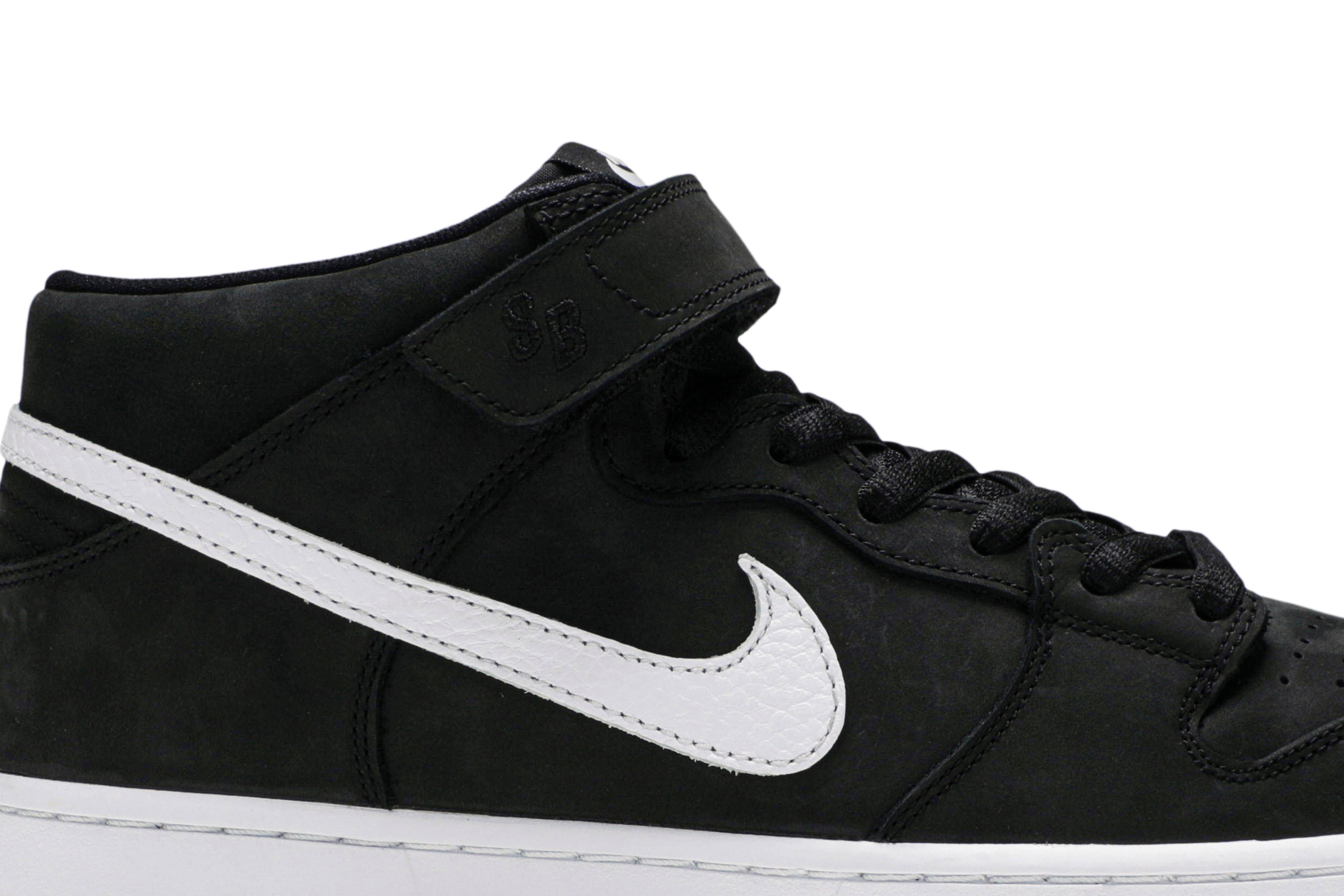 nike dunks black and white mid