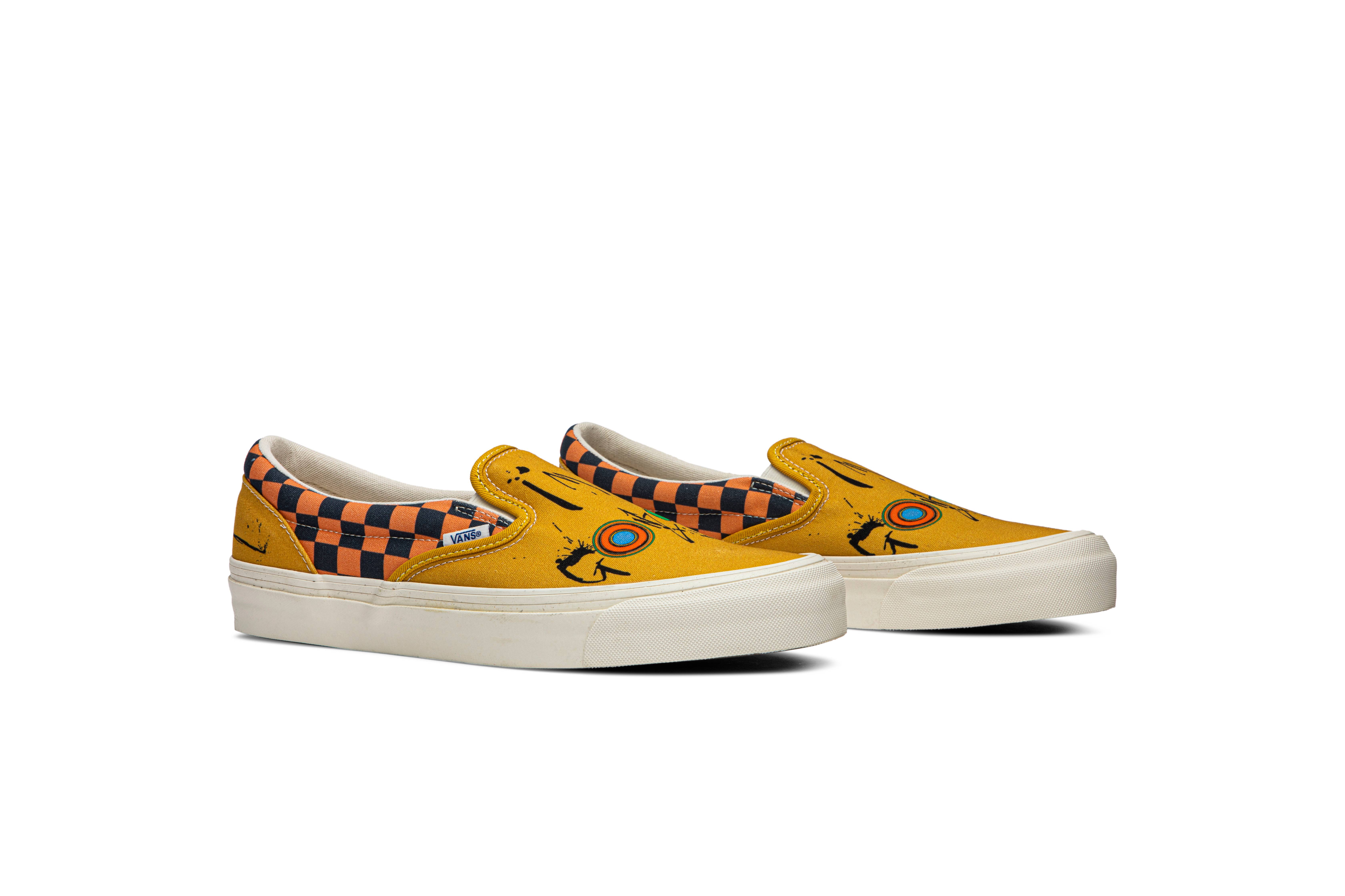 vans slip on orange checkerboard