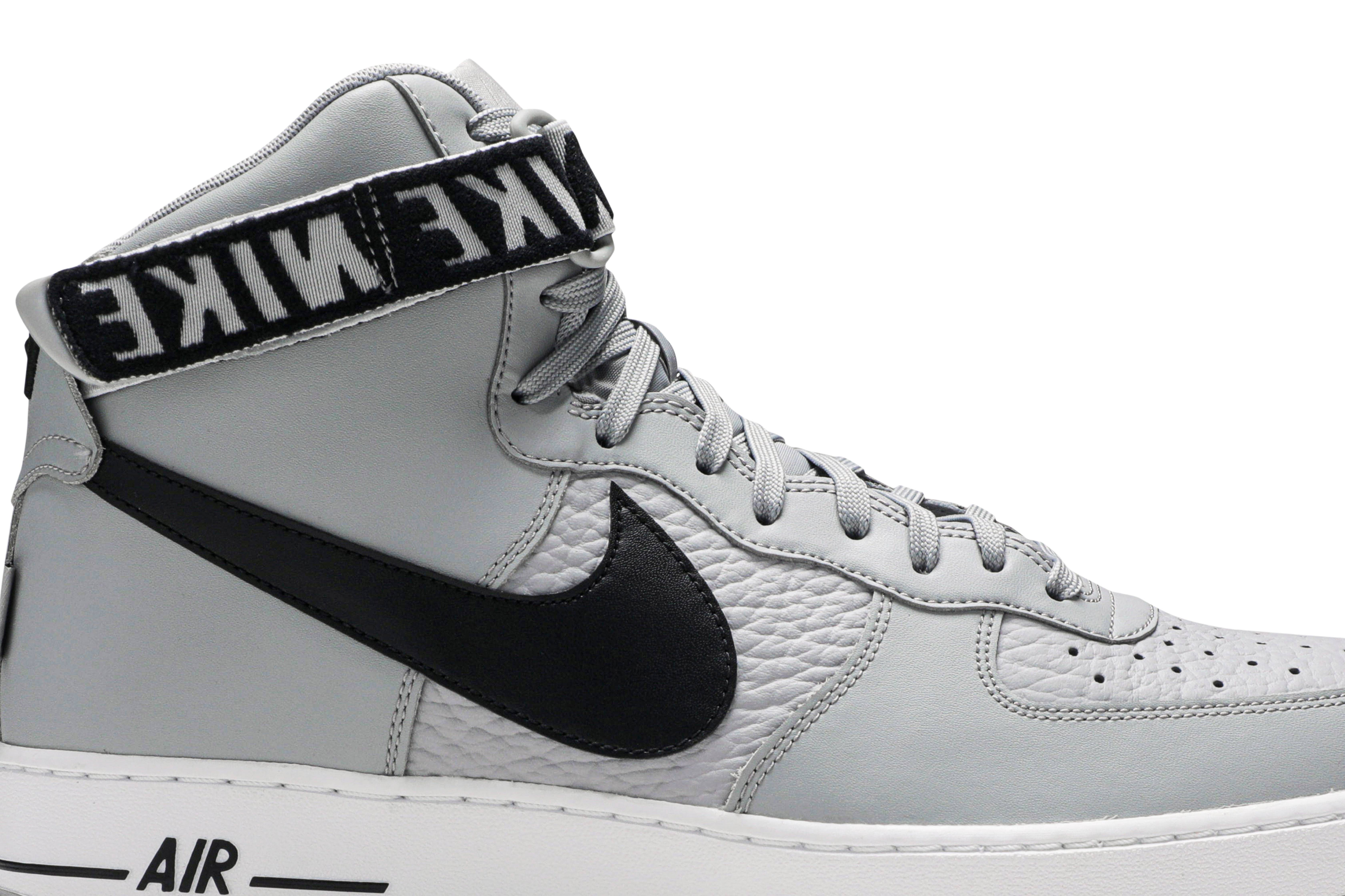 silver and black nike high tops