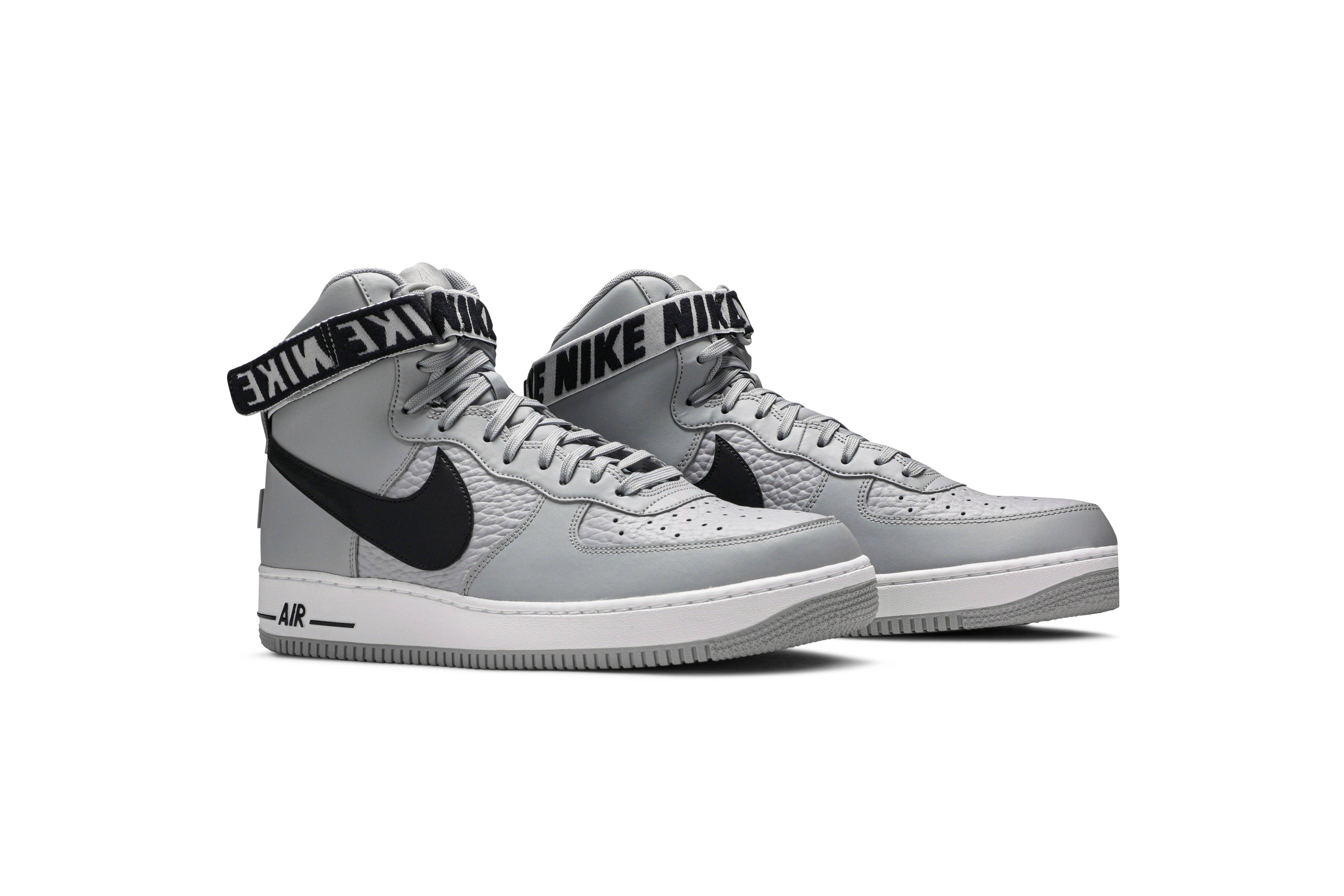 silver and black nike high tops