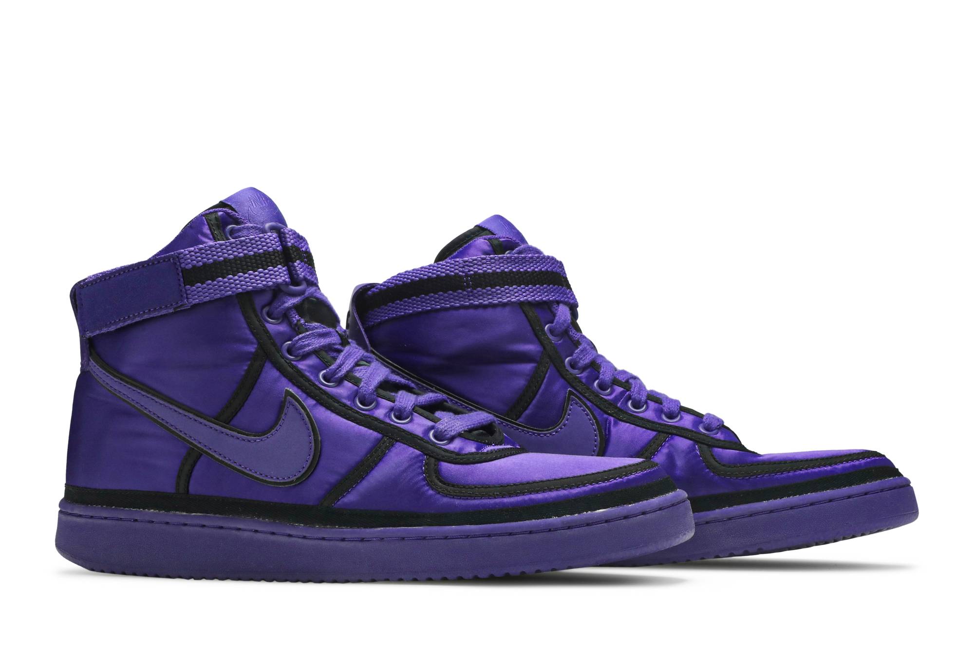 purple nike vandals