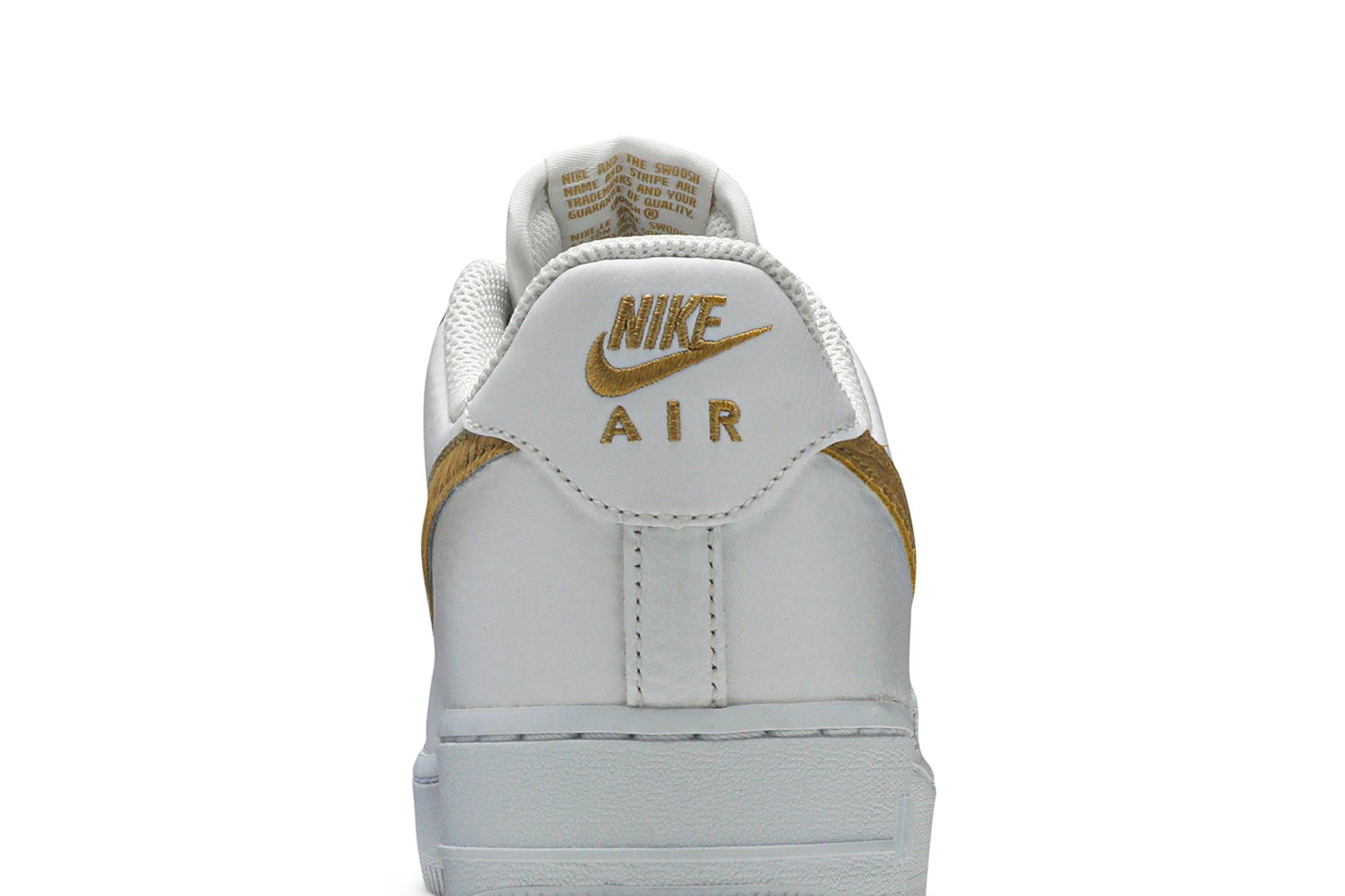 white nike rose gold swoosh